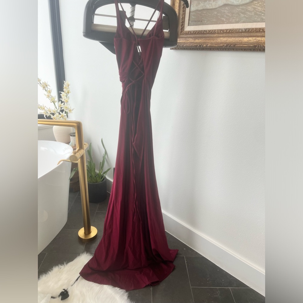 Gorgeous worn once La Femme criss cross tie back long dress